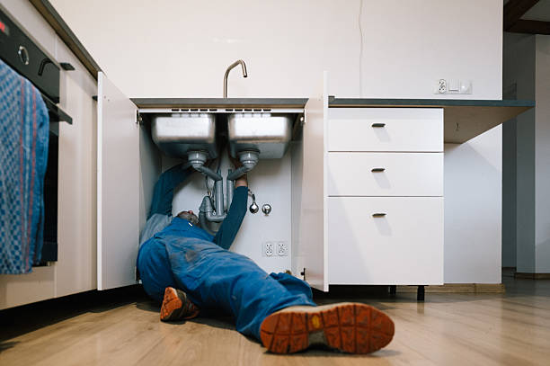 Professional Plumbing technician working in Spencerville, MD